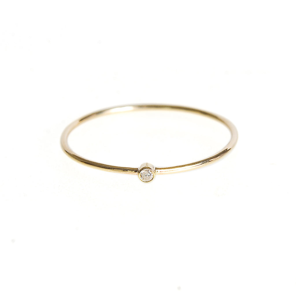 Thin stack ring with diamond