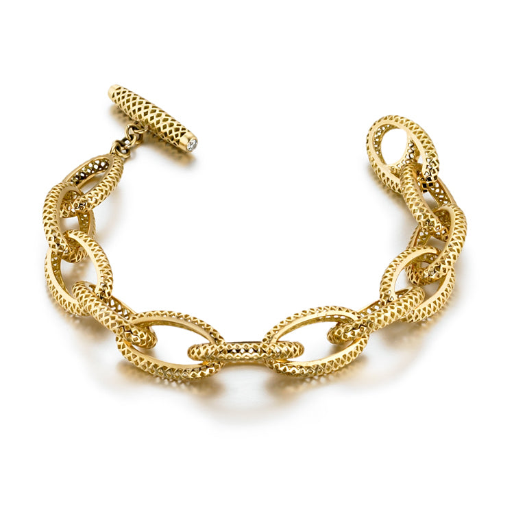 Small yellow gold oval crownwork bracelet